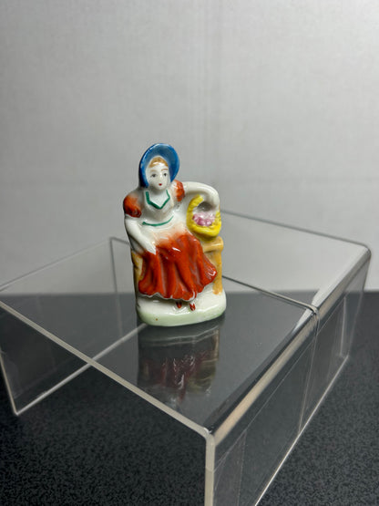 "Occupied Japan" Lady Sitting with Basket Figure