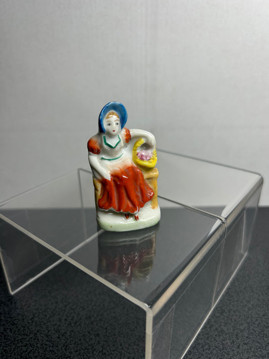"Occupied Japan" Lady Sitting with Basket Figure