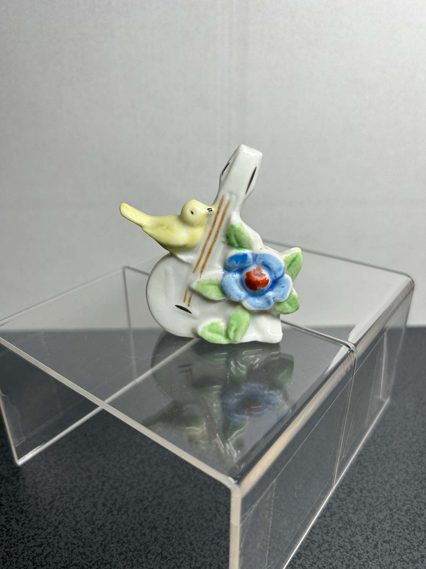 "Japan" Yellow Bird on Bass Figure