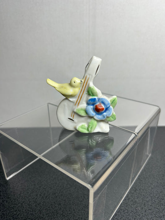 "Japan" Yellow Bird on Bass Figure